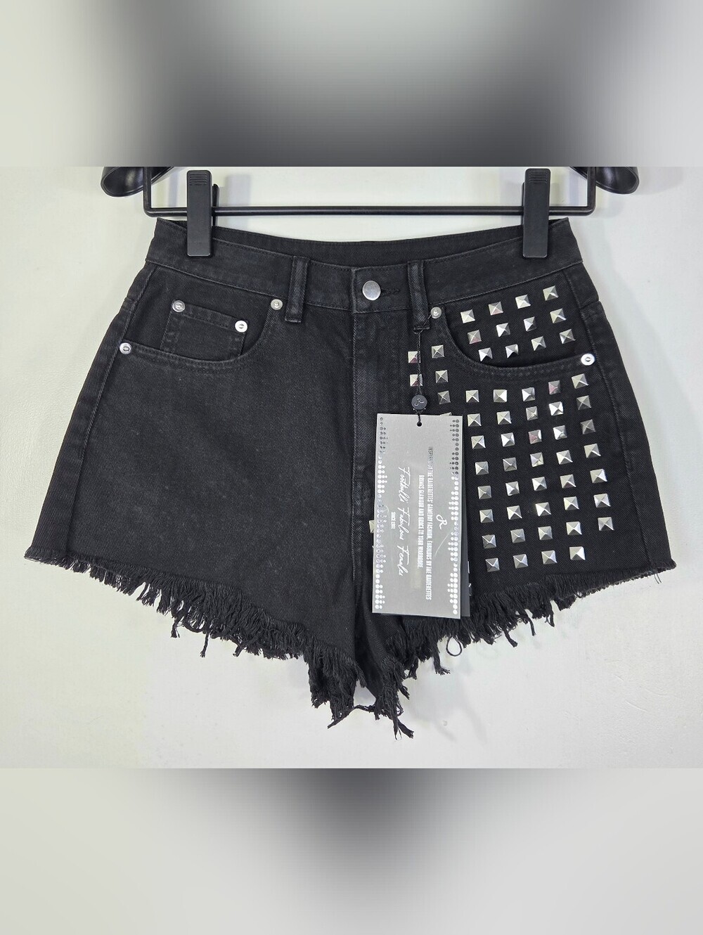 NWT FABULOUS BY THE RAIDERETTES DENIM STUDDED FRAYED SHORTS.